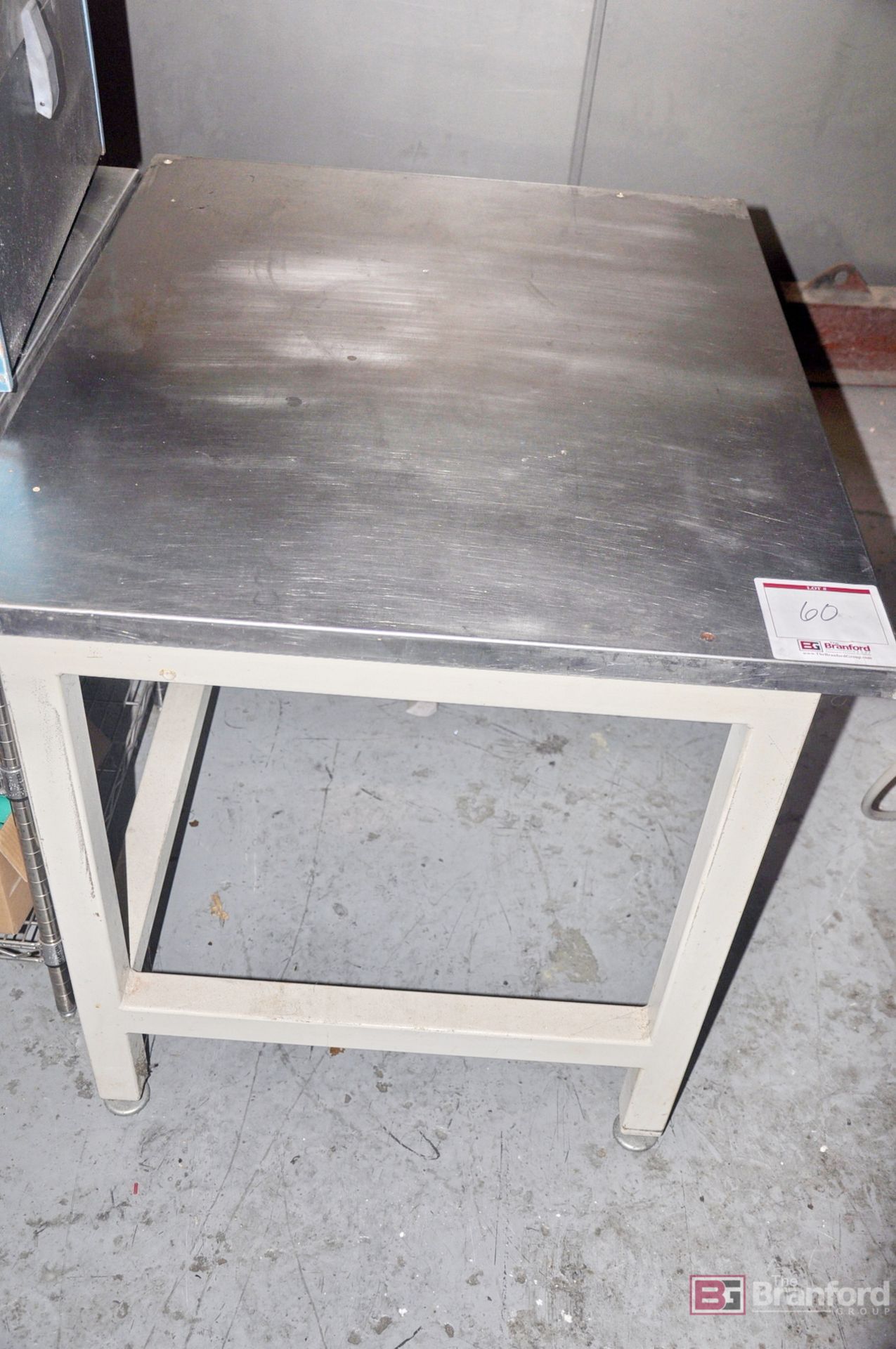 Stainless steel top powder coated table