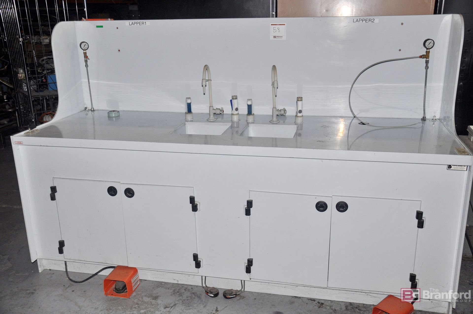 Dual Poly sink, w/ work space foot controllers & cabinets