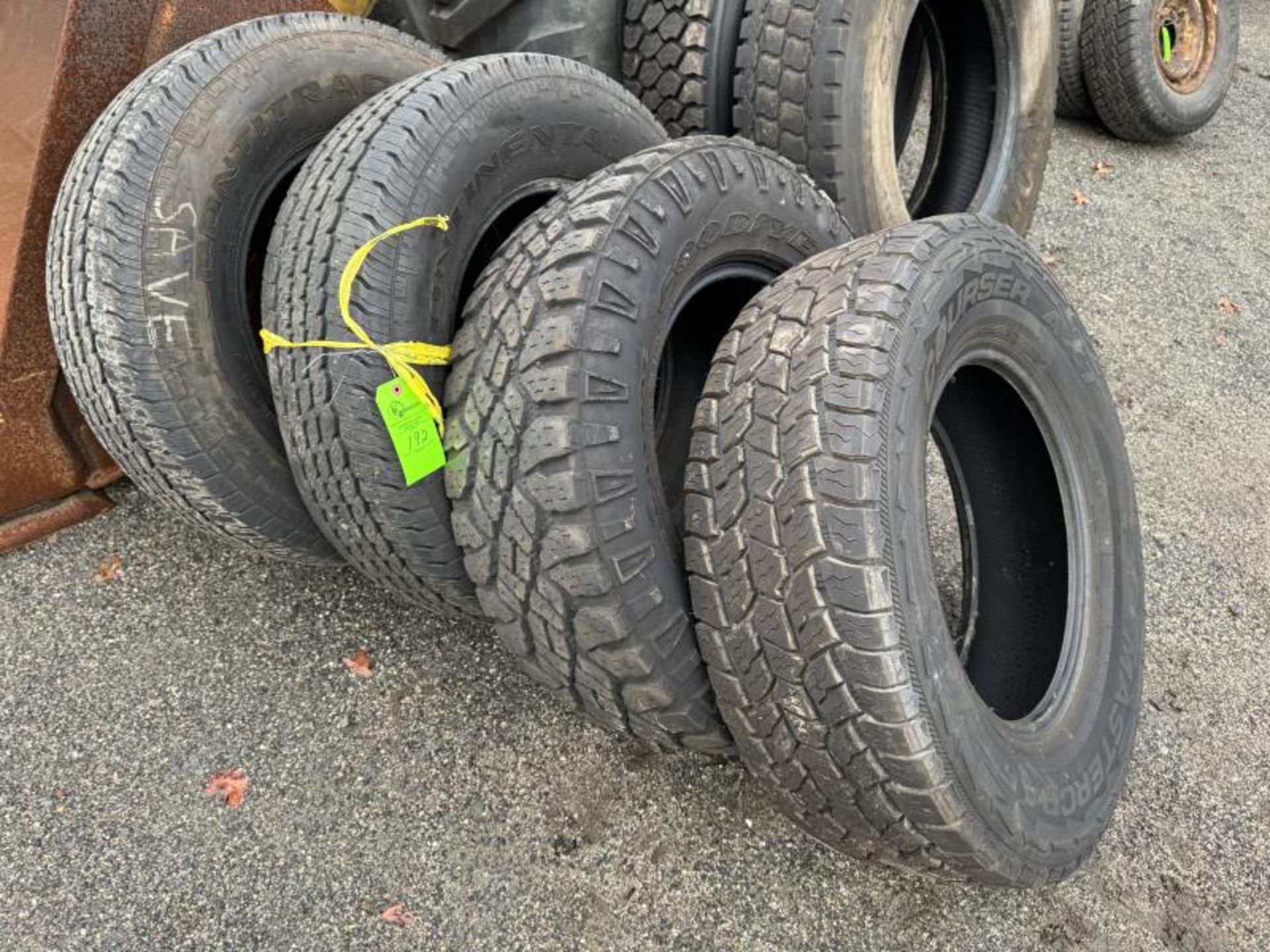 Lot of (4) Tires Including: (1) Courser AXT Master Craft, (1) Goodyear Wrangler Duratrac, (2) Contit