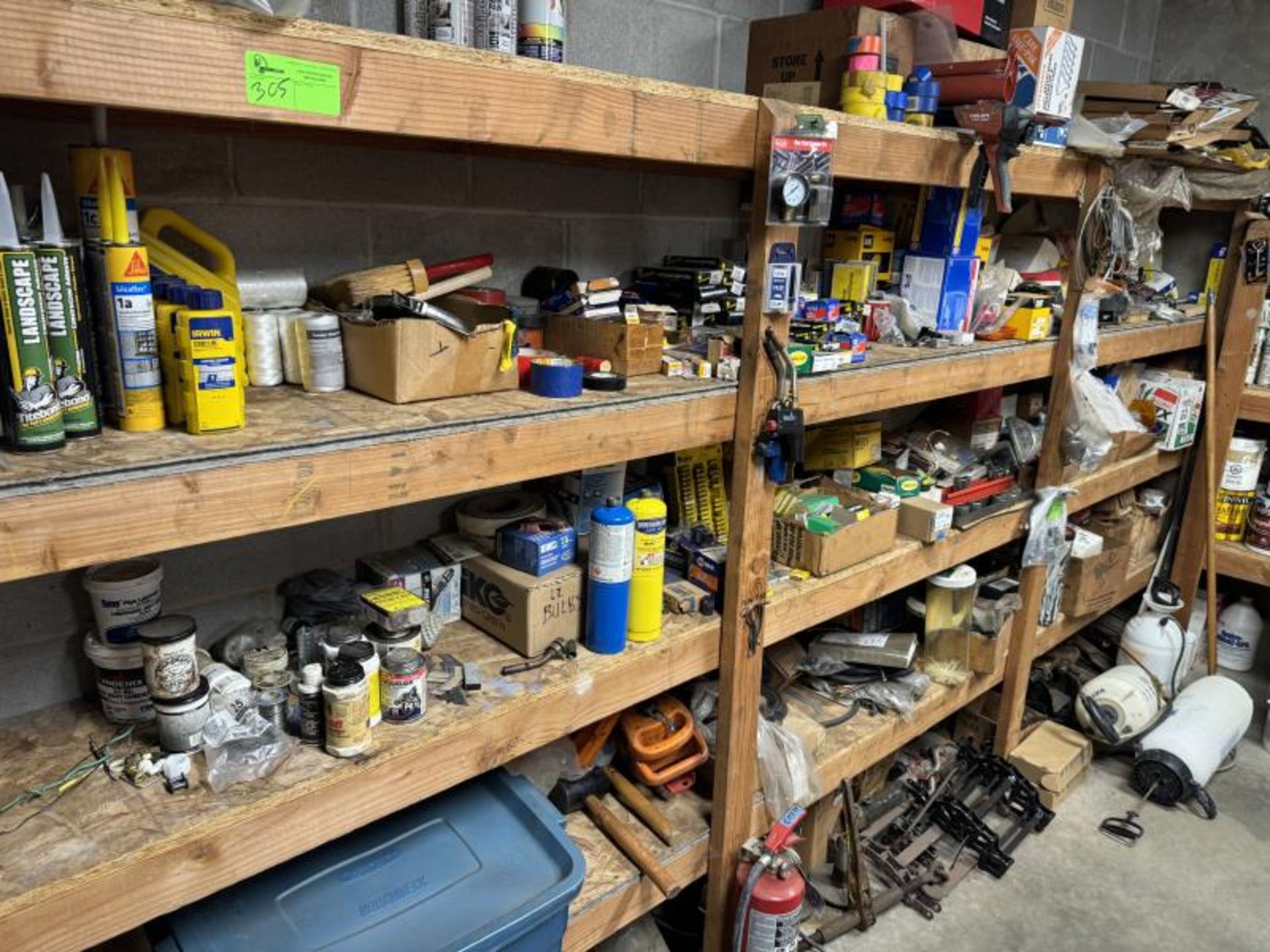 Contents of Shelving Unit (NOT SHELF) Including: Spray Paint, Concrete Adhesive, Vehicles Fuses, Veh