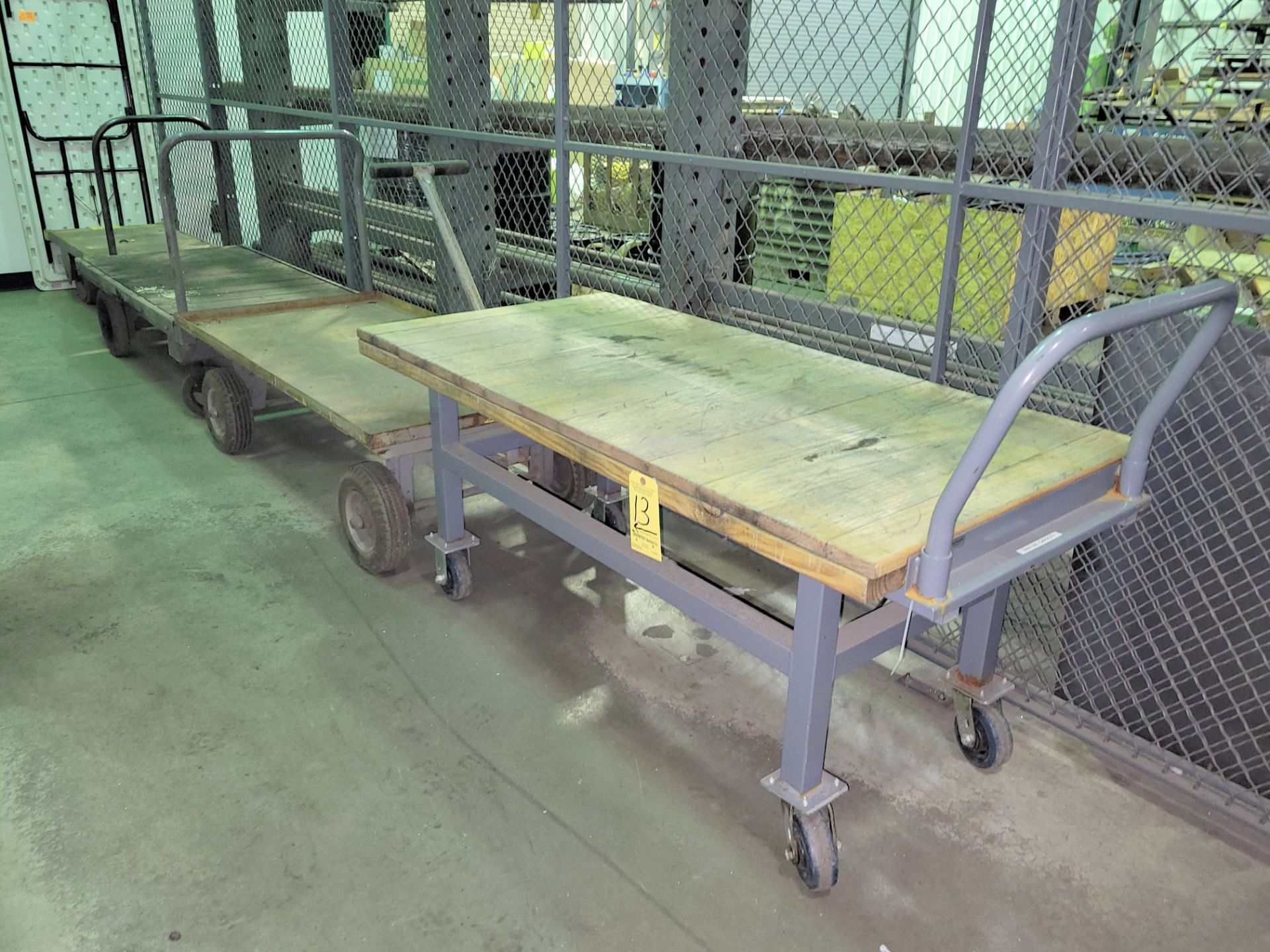 Lot - (3) 30 in. x 60 in. and (1) 24 in. x 48 in. Flat Deck Shop Carts