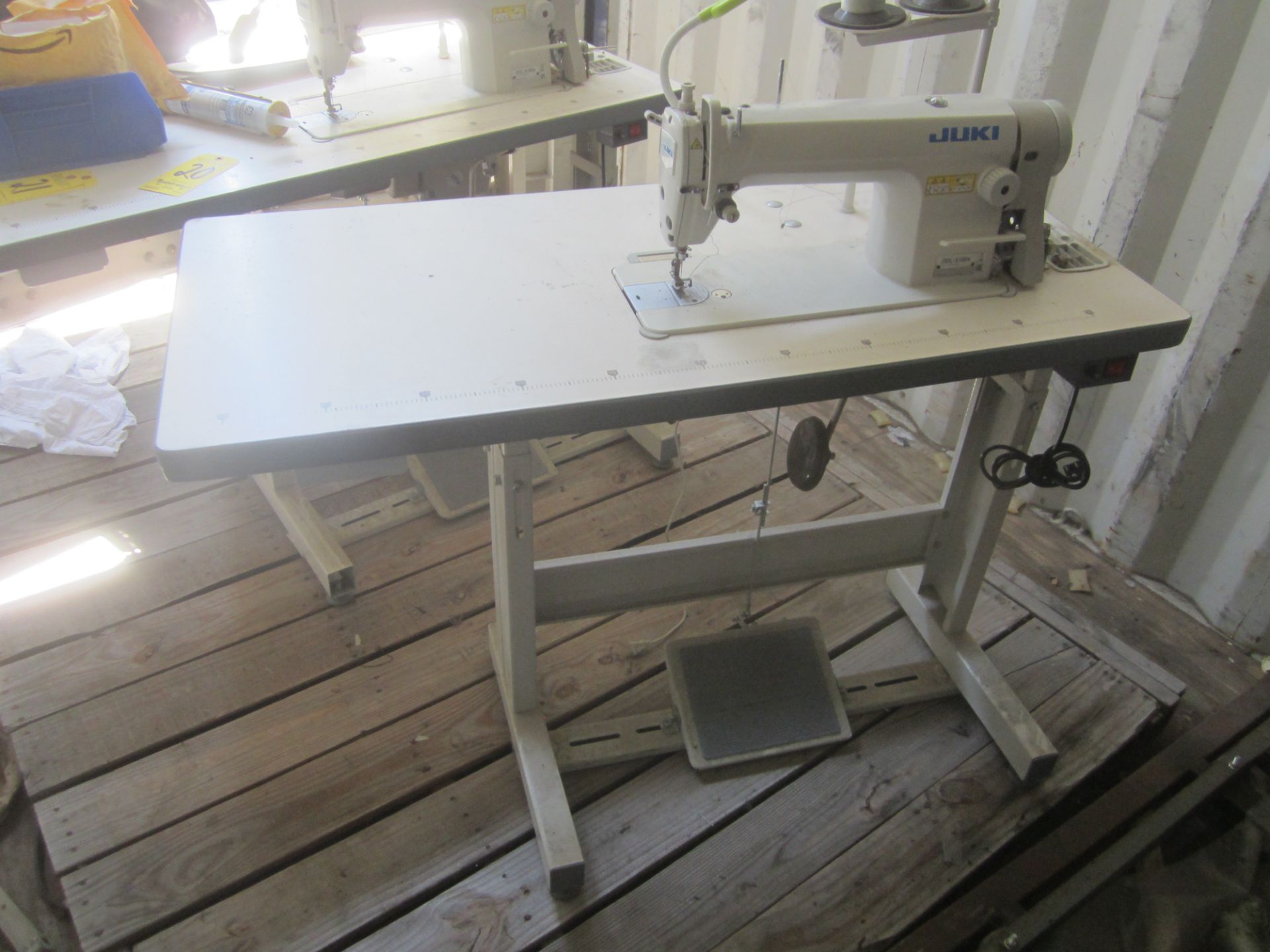 Juki Model DDL-8100e Industrial Sewing Machine, s/n PD0NL02059, with Table, Used only 6 Months