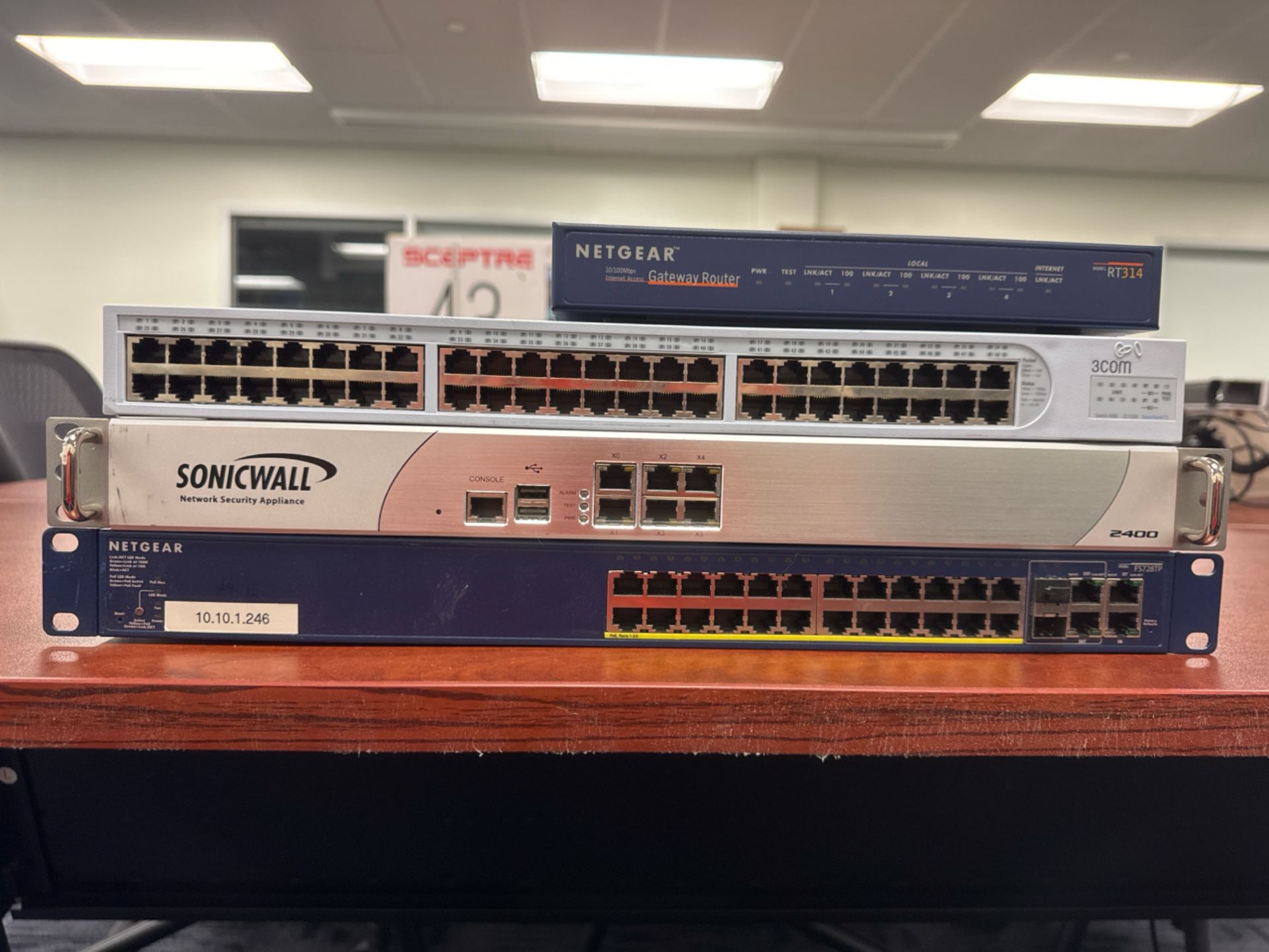 TUV Network Switch, (2) Netgear Network Switches, & Sonicwall Network Switch Boards