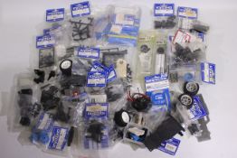 Kyosho - A large quantity of mainly Kyosho spare parts suitable for RC car modelling.