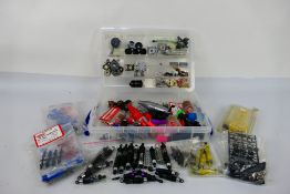 Kyosho - A quantity of mainly Kyosho spare parts suitable for RC car modelling.