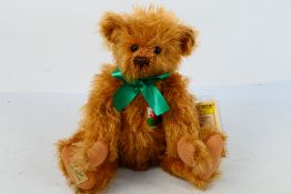 Deans Rag Book Company - A limited edition jointed mohair bear named Welsh Bear.