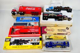 Ertl - Norscot - Liberty Classics - 9 x boxed truck models including a Peterbilt in CAT livery in