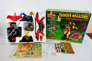 Power Rangers - Thunder Megazord A Vintage 90s Thunder Megazord, five powerful zords.