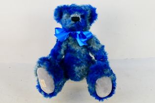 Deans Rag Book Company - A limited edition jointed mohair bear named Justyn.