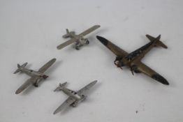 French Dinky - Four unboxed early French Dinky diecast aircraft.