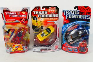 Hasbro - Transformers - 3 x carded Autobot models from 2006-8 Rodimus # 81293,