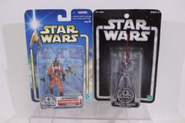 Star Wars - Hasbro. A pair of Star Wars Silver Anniversary 3 3/4" figures, appearing Mint on Card.