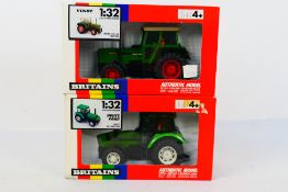 Britains. Two boxed Britains Tractors appearing in VG condition in Good boxes.