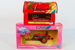 Britains. Three boxed Britains Agricultural Equipment appearing in VG condition in Good Poor boxes.