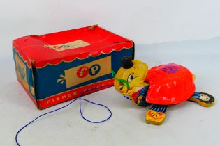 Fisher Price - A 1950s boxed Fisher Price Uncle Timmy Turtle pull along toy # 125.