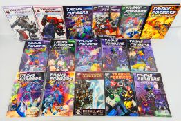 Titan Books - Transformers - A collection of graphic novels and 2 x Official Guidebooks including