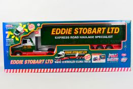 Control Freaks - A boxed 1:18 scale radio controlled 'Eddie Stobart Ltd.' Scania truck.