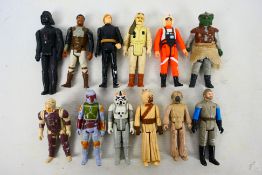 Star Wars - LFL - CPG - GMFGI - A group of 12 loose vintage Star Wars action figures.