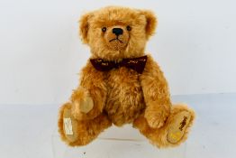 Dean's Rag Book - A limited edition jointed mohair bear named Dominic with a growler.
