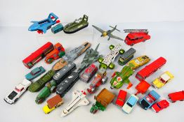 Dinky Toys - An unboxed group of approximately 30 playworn Dinky Toys.