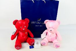Swarovski - Build a Bear. A Pink and a Red multi toned build a bears with Crystals from Swarovski.