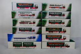 Atlas Editions - 12 boxed diecast 1:76 scale 'Eddie Stobart' liveried diecast model trucks from