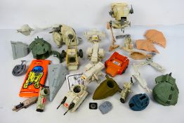 Star Wars - Kenner - A group of playworn, unboxed Star Wars vehicles and accessories.