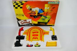 The Simpsons - Scalextric - Skateboard Chase.