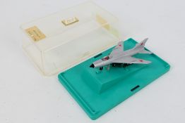 Russian Maker - A boxed diecast 1956 MIG 21 fighter jet in 1:120 scale in a perspex display case.