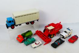Britains - Dinky Toys - Corgi Toys - A small collection of unboxed diecast model vehicles in