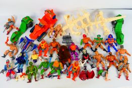 MOTU - Mattel - A collection of loose figures, vehicles,