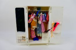 Sindy Pedigree - An unboxed vintage Sindy wardrobe and a collection of clothes and accessories