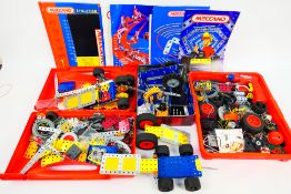 Meccano - A collection of modern Meccano including sets of wheels,