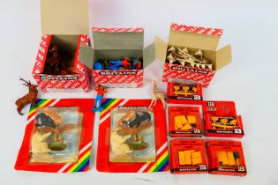 Britains - A mixed collection of boxed Britains plastic figures and accessories.