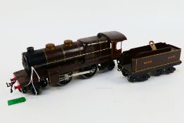 Hornby - A clockwork O Gauge 4-4-2 steam locomotive number 31801.