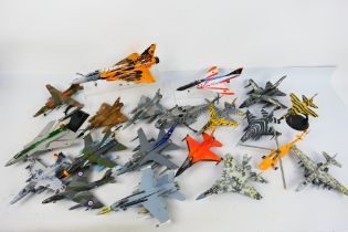 A squadron of 19 built model military aircraft plastic kits in various scales from numerous