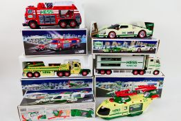 Hess - 5 x boxed battery powered car, truck and aircraft models including Fire truck with car,
