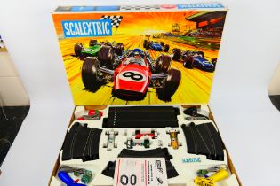 Scalextric - A boxed vintage Scalextric 4 x car Grand Prix set 80.