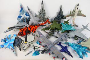 A fleet of 17 built model military aircraft plastic kits in various scales from numerous