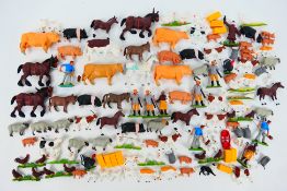 Britains - Over 100 loose Britains plastic Farm animal, Farm workers and accessories.