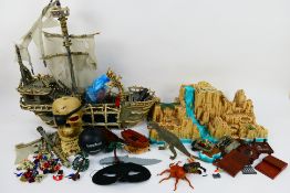 Mega Bloks - An unboxed Mega Bloks Pyrates Ship and Pyrates Island play sets.