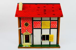 Toy Works - A 1970s wooden 4 room dolls house with furniture by Toy Works.