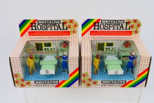 Britains - Two boxed Britains #7854 'Hospital Series' Nursing Sister & Patient sets.