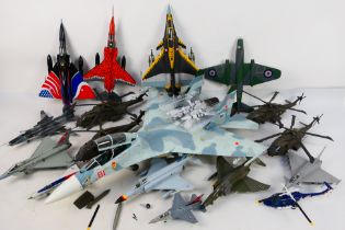 17 built model military aircraft plastic kits in various scales from numerous manufacturers.