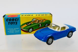 Corgi - A boxed Lotus Elan Coupe with detachable chassis in blue and white # 319.