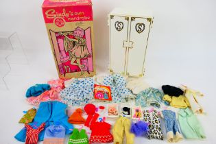 Sindy Pedigree - A boxed vintage Sindy wardrobe and a collection of clothes and accessories