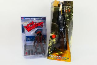 Neca - Mezco - Two boxed / carded collectible action figures.