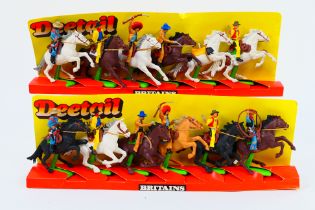 Britains - Two sets of Britains Deetail mounted Cowboys / Mexican on display strip.