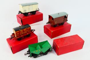 Hornby - Four boxed O gauge items of rolling stock.