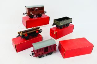 Hornby - Four boxed O gauge items of rolling stock.